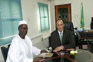 Le président du PMC Arc-en-ciel effectue une visite de courtoisie chez le nouveau directeur général de l’Office National de l’état Civil